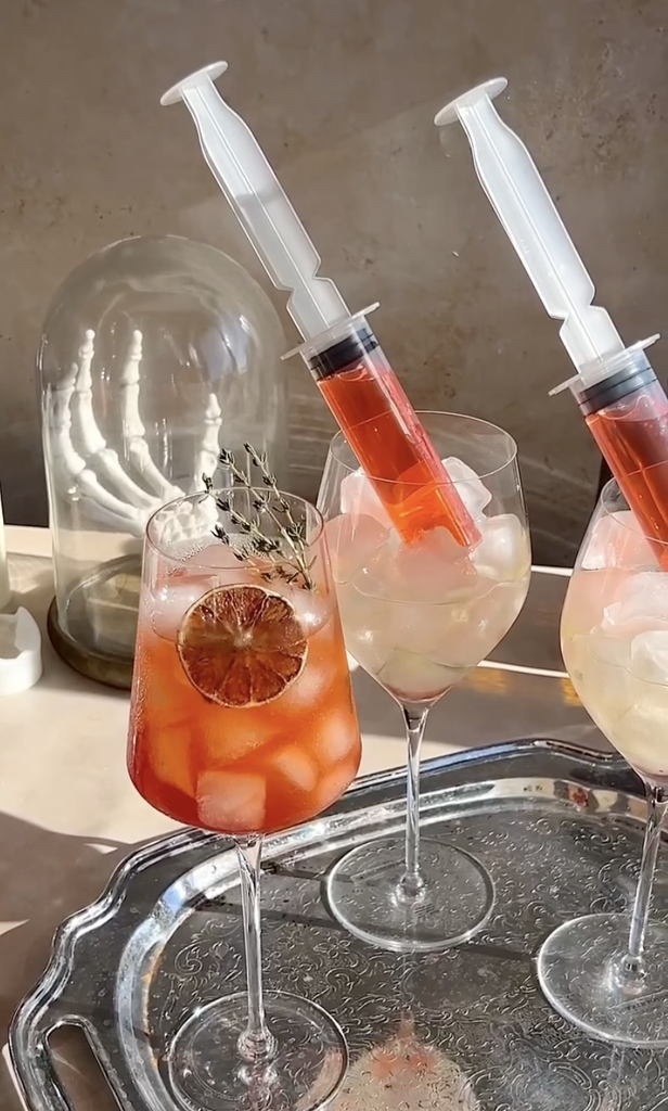 halloween aperol spritz with syringes