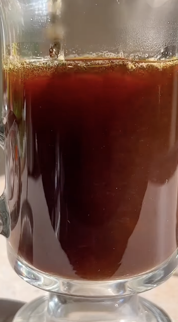 Irish coffee being stirred