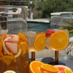 rose sangria with cardamom orange syrup