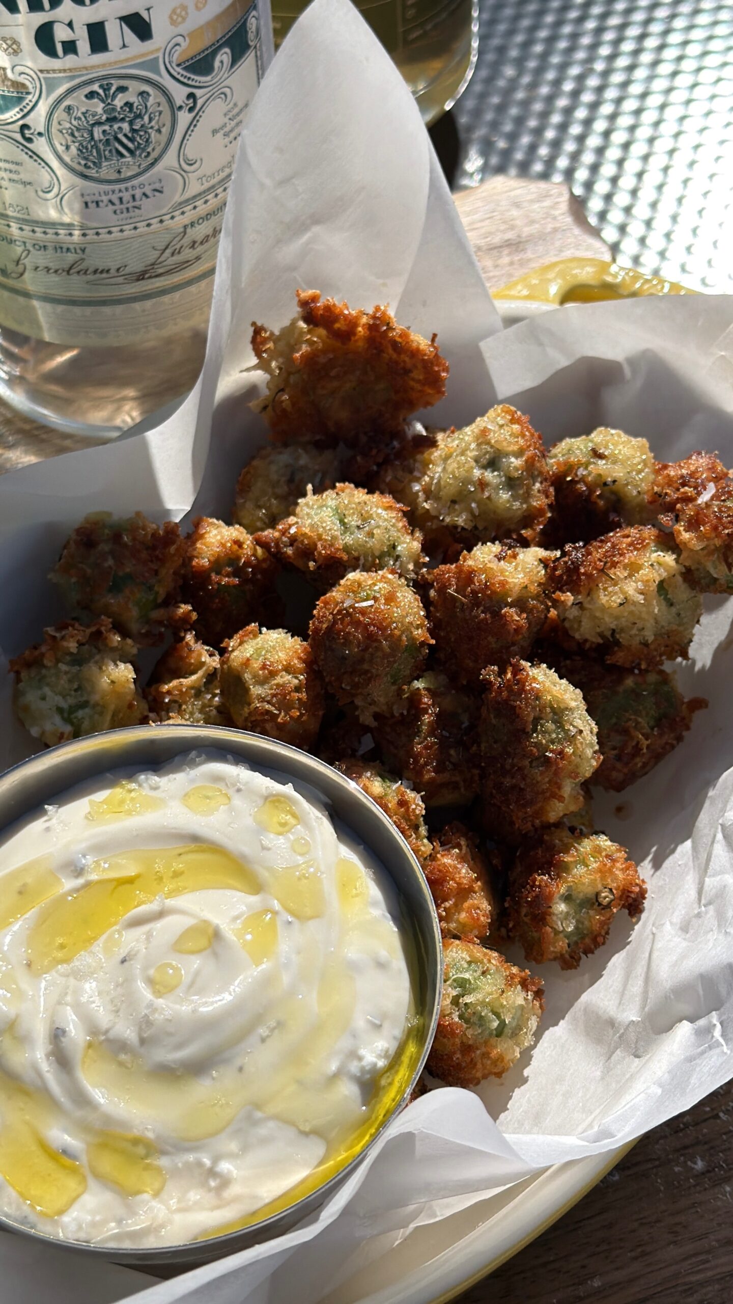 Mozzarella-Stuffed Fried Olives with Whipped Ricotta & Hot Honey