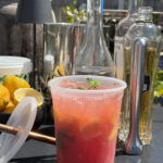 watermelon hugo spritz cocktail in a deli container