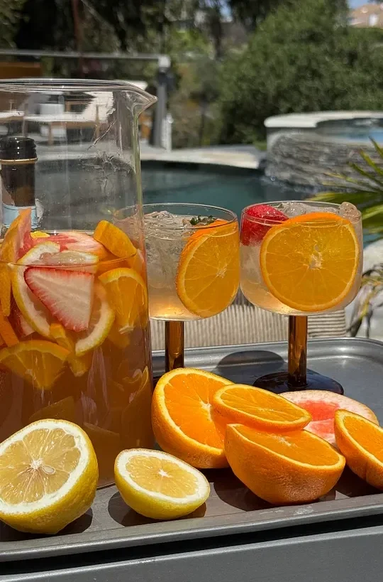 rose sangria with cardamom orange syrup